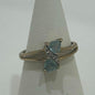 9CT Gold Ring with sparkling Gems &  Two Large Light Blue Coloured Gems