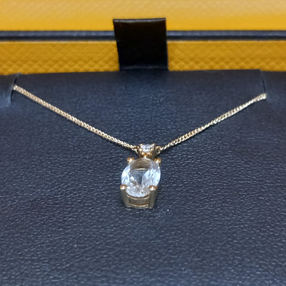 18CT GOLD PENDANT WITH PINK-HUE AND WHITE STONES WITH CHAIN