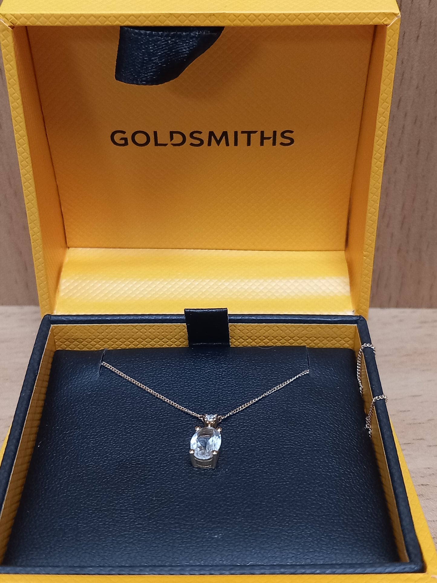 18CT GOLD PENDANT WITH PINK-HUE AND WHITE STONES WITH CHAIN