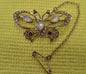 9CT GOLD BUTTERFLY BROOCH, OPALS AND RED STONES