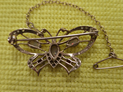 9CT GOLD BUTTERFLY BROOCH, OPALS AND RED STONES
